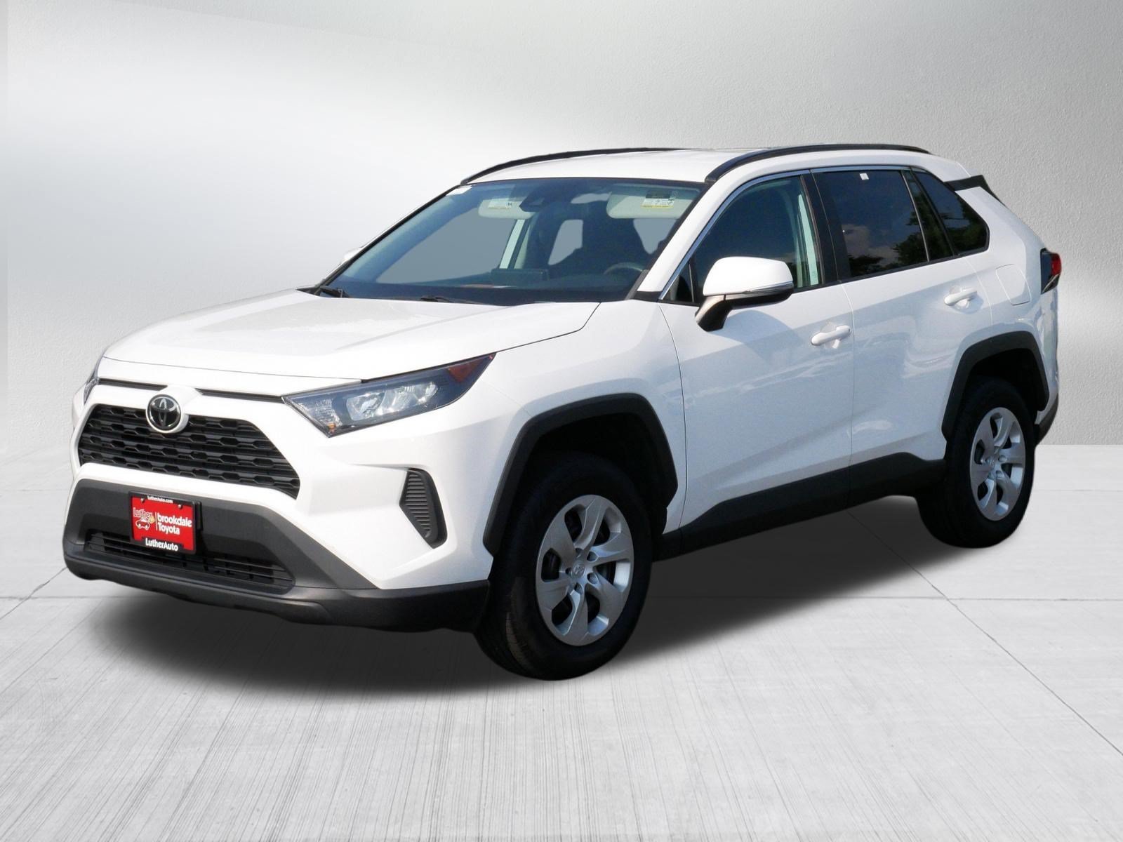 Used 2021 Super White Toyota LE image 3