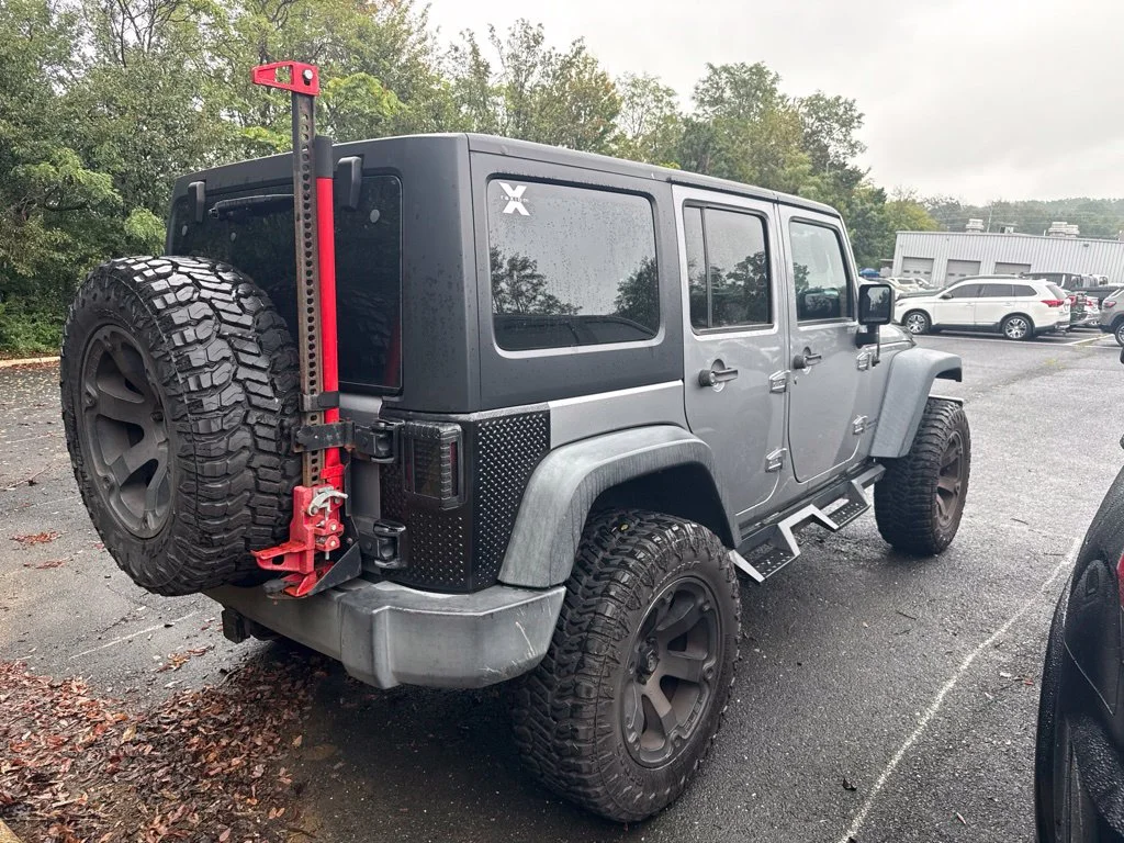Used 2017 Silver Jeep Unlimited Sport image 4