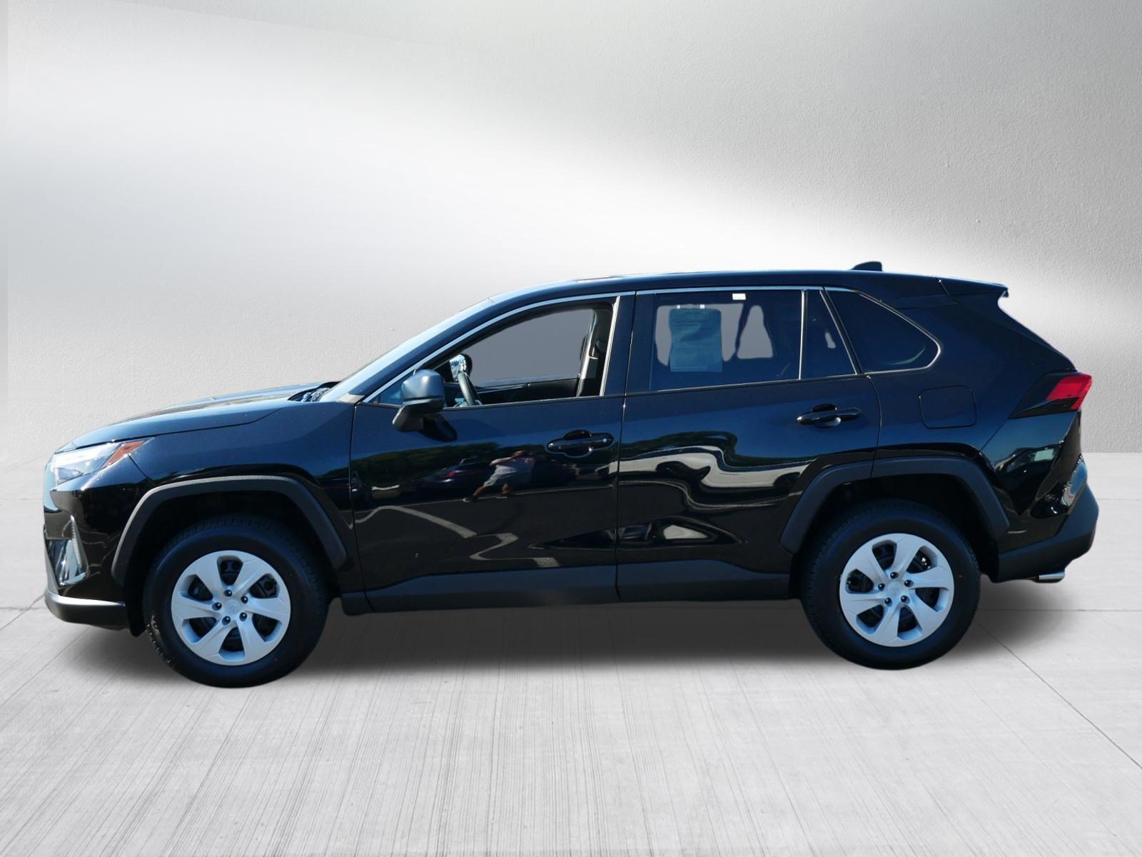 Certified Used 2025 Midnight Black Metallic Toyota LE image 4