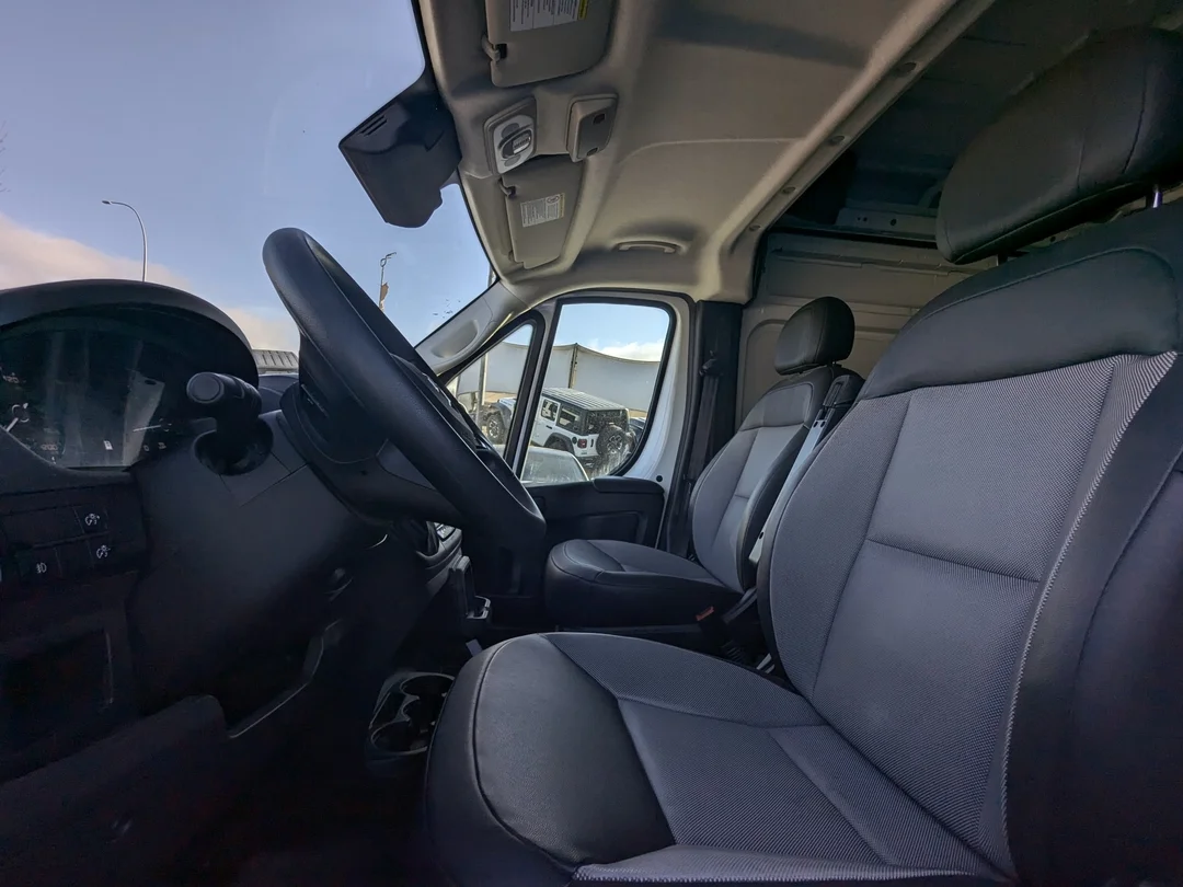 Certified Used 2025 White RAM Tradesman - - C/V HR 136 WB - Pkg 22B - Convenience Grp - Mopar Cargo Mat - Wall Paneling & More! image 13