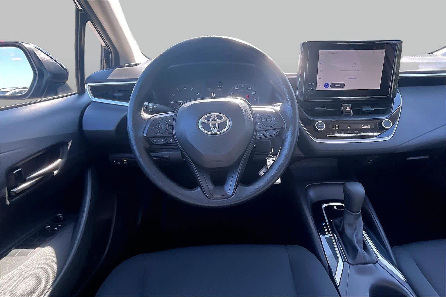 Used 2025 Midnight Black Metallic Toyota LE image 6