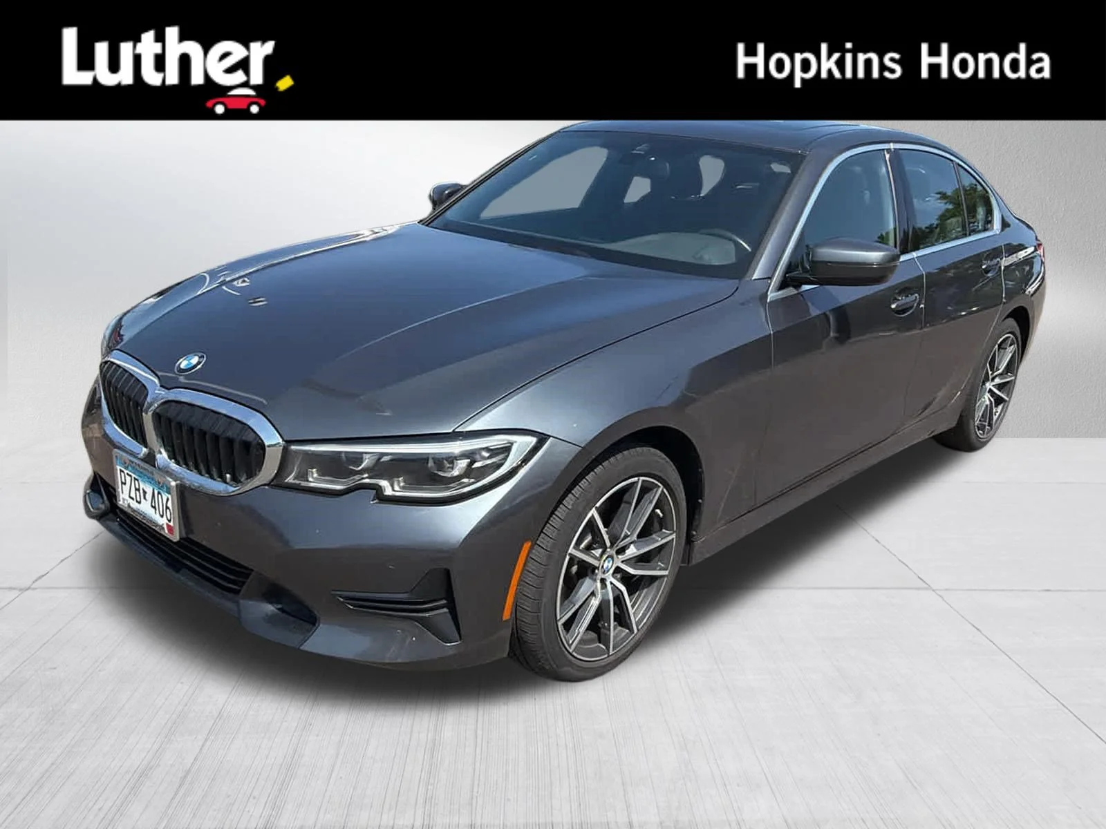 Used 2019 Mineral Gray Metallic BMW 330i xDrive image 1