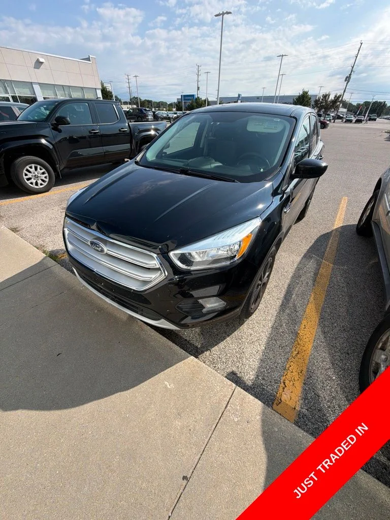 Used 2017 Black Ford SE image 1