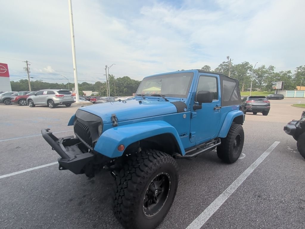 Used 2011 Blue Jeep Sahara image 1