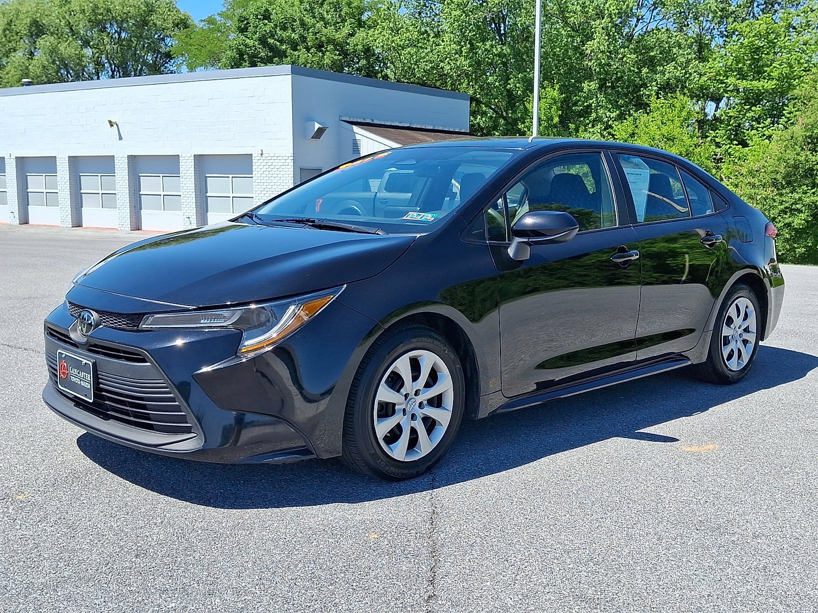 Used 2025 Midnight Black Metallic Toyota LE image 3