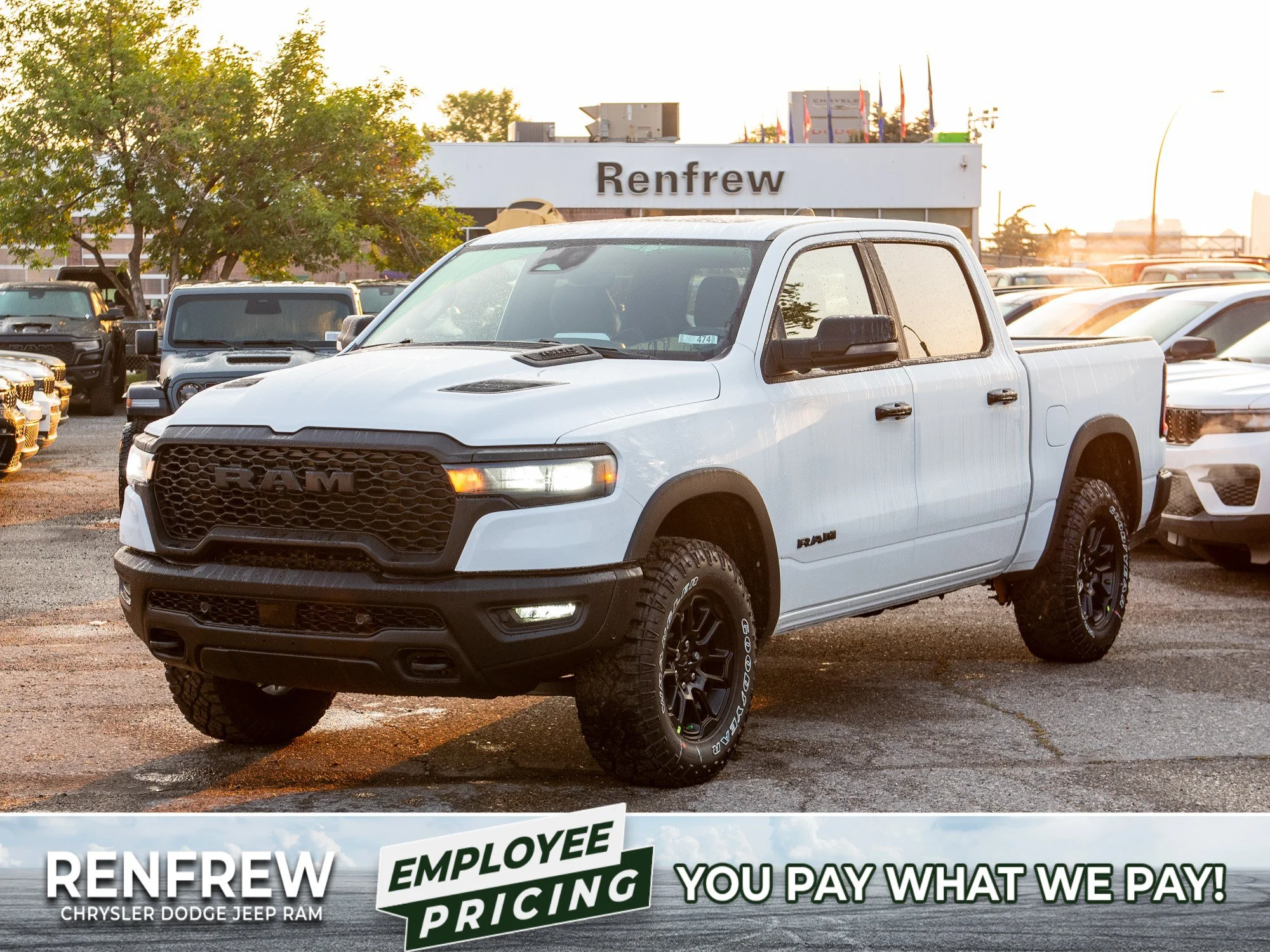 New 2026 White RAM Rebel* Crew Cab 4x4, 33 Inch A/T Tires, Sunroof, Passenger Screen image 1