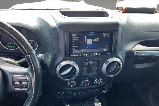 Used 2013 Black Jeep Unlimited Sport image 4