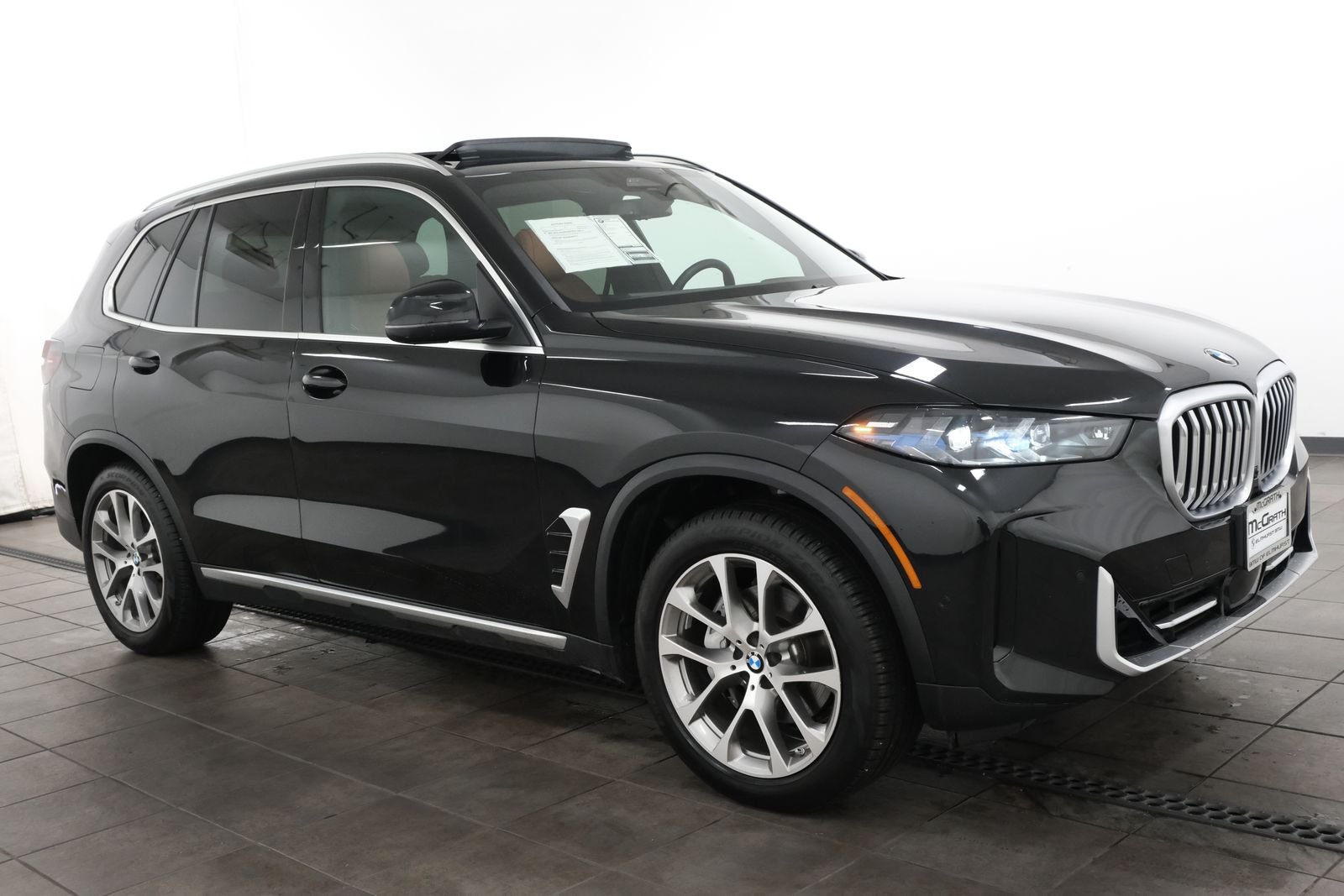 Certified Used 2024 Black Sapphire Metallic BMW xDrive40i image 7