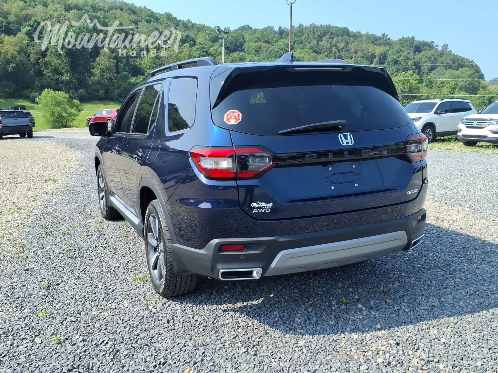 Used 2025 Obsidian Blue Pearl Honda Touring image 6