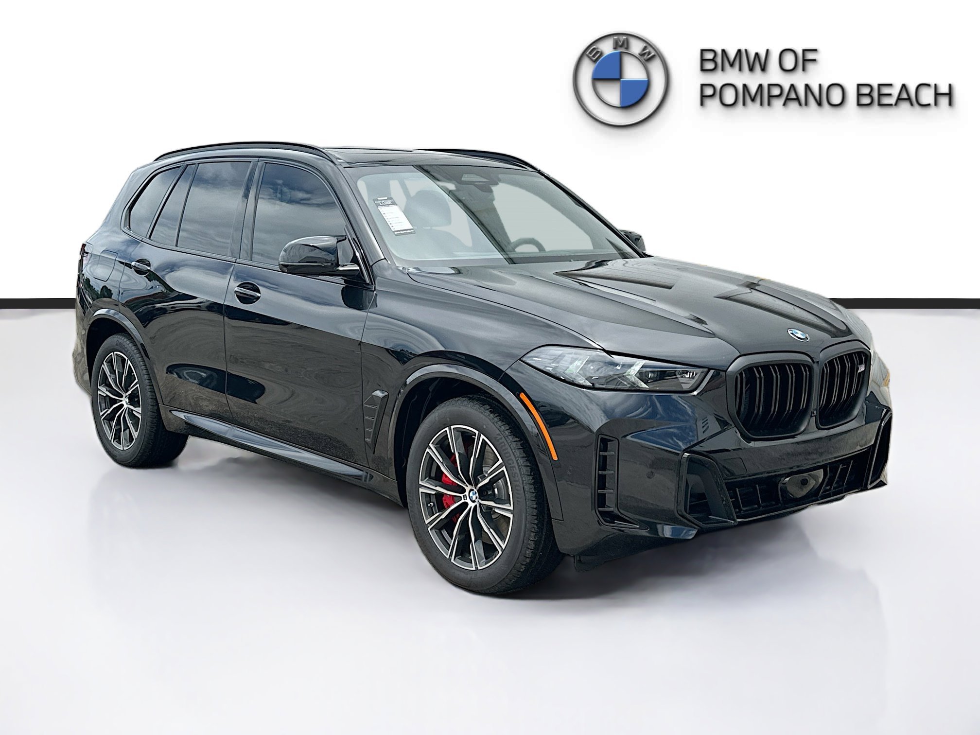 New 2026 Black Sapphire Metallic BMW M60i image 1