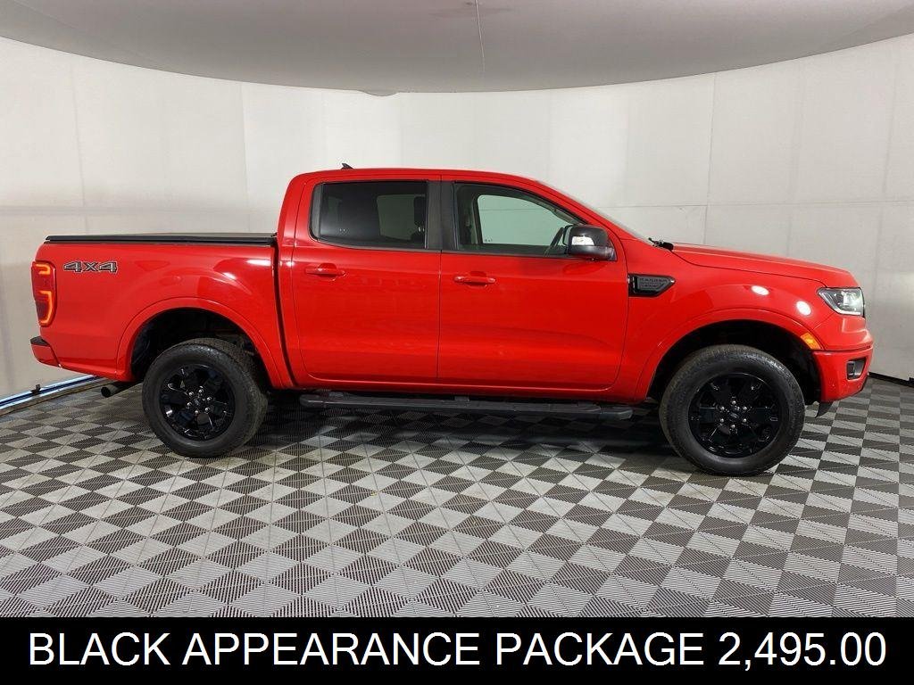 Used 2021 Rapid Red Metallic Tinted Clea Ford Lariat image 4
