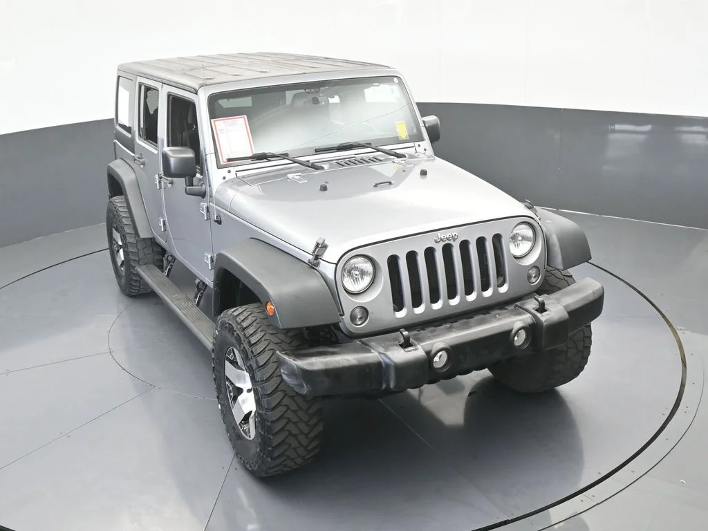 Used 2016 Billet Silver Metallic Clearcoat Jeep Unlimited Sport image 44