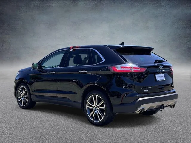 Used 2022 Black Ford Titanium image 4