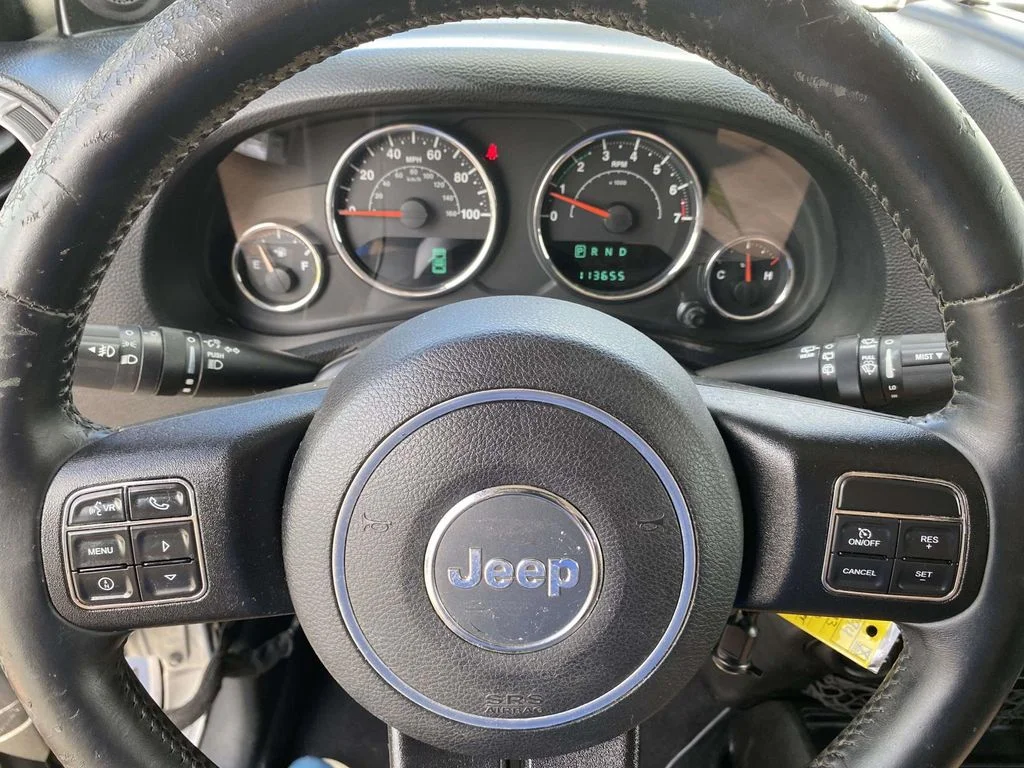 Used 2013 Silver Jeep Sport image 26