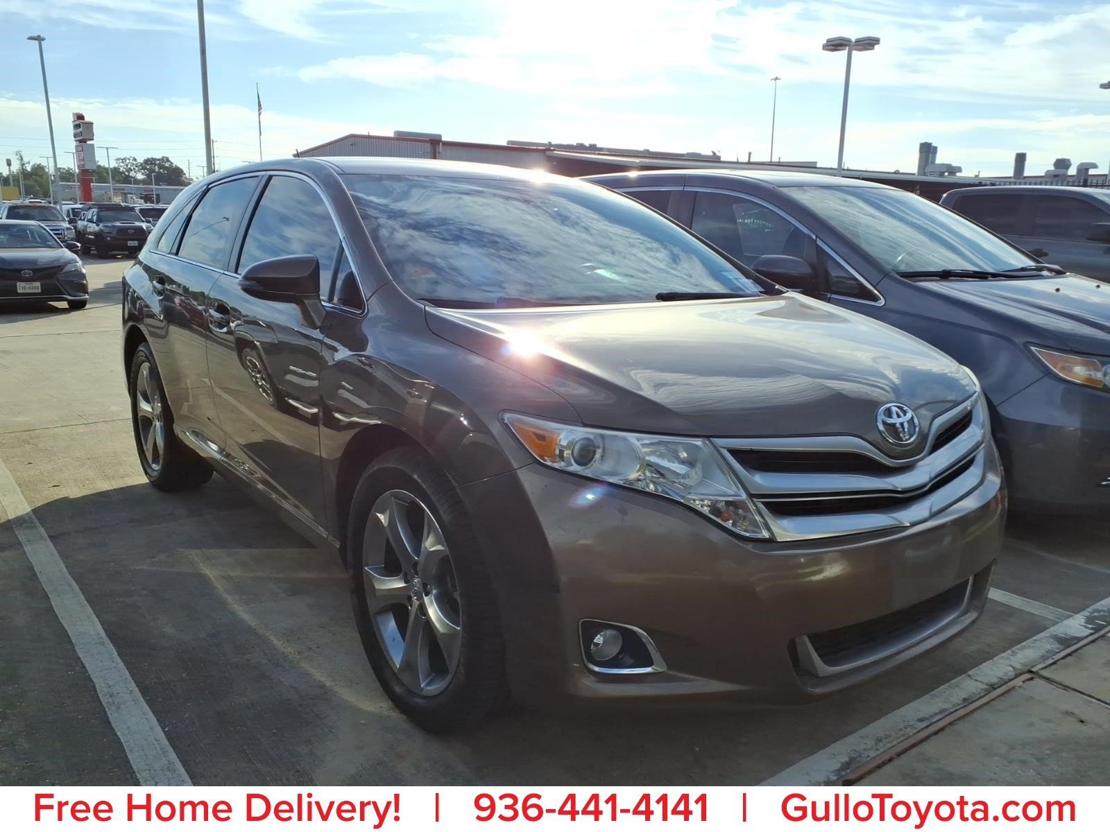Used 2013 Golden Toyota LE image 1