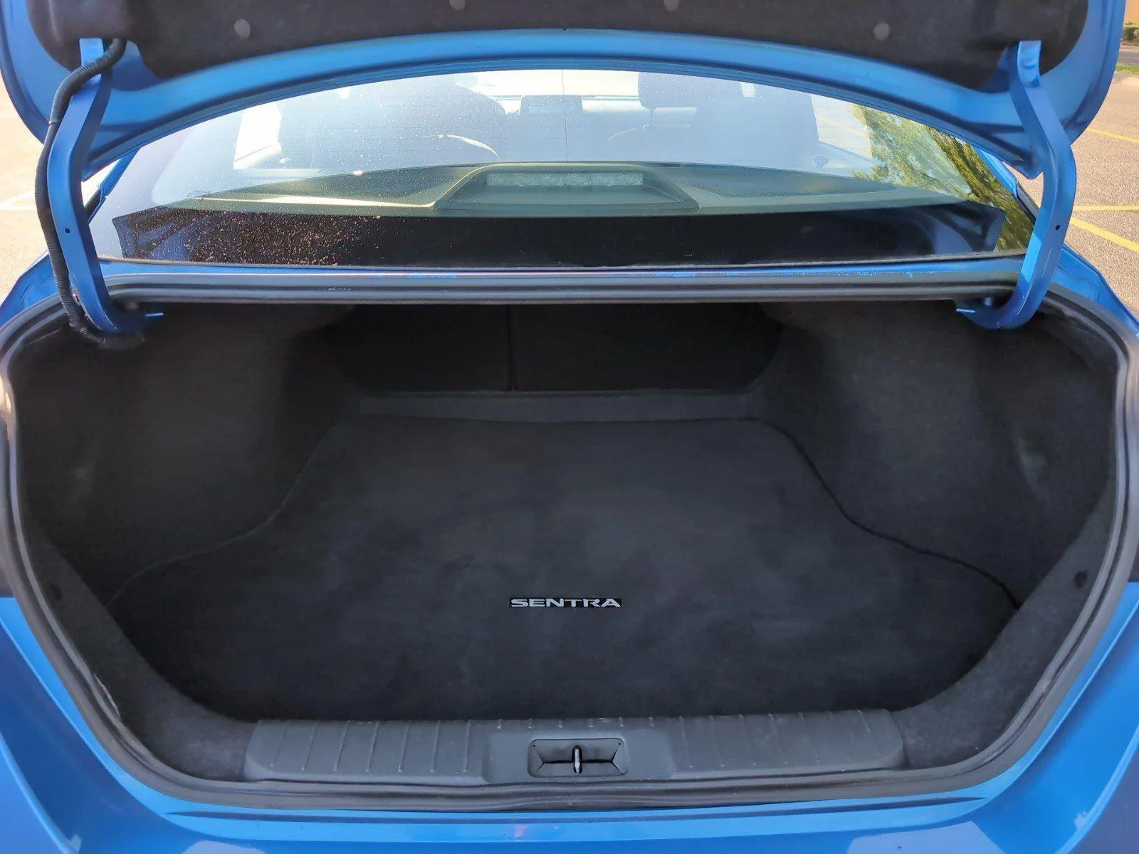 Used 2024 Electric Blue Metallic Nissan SV image 6