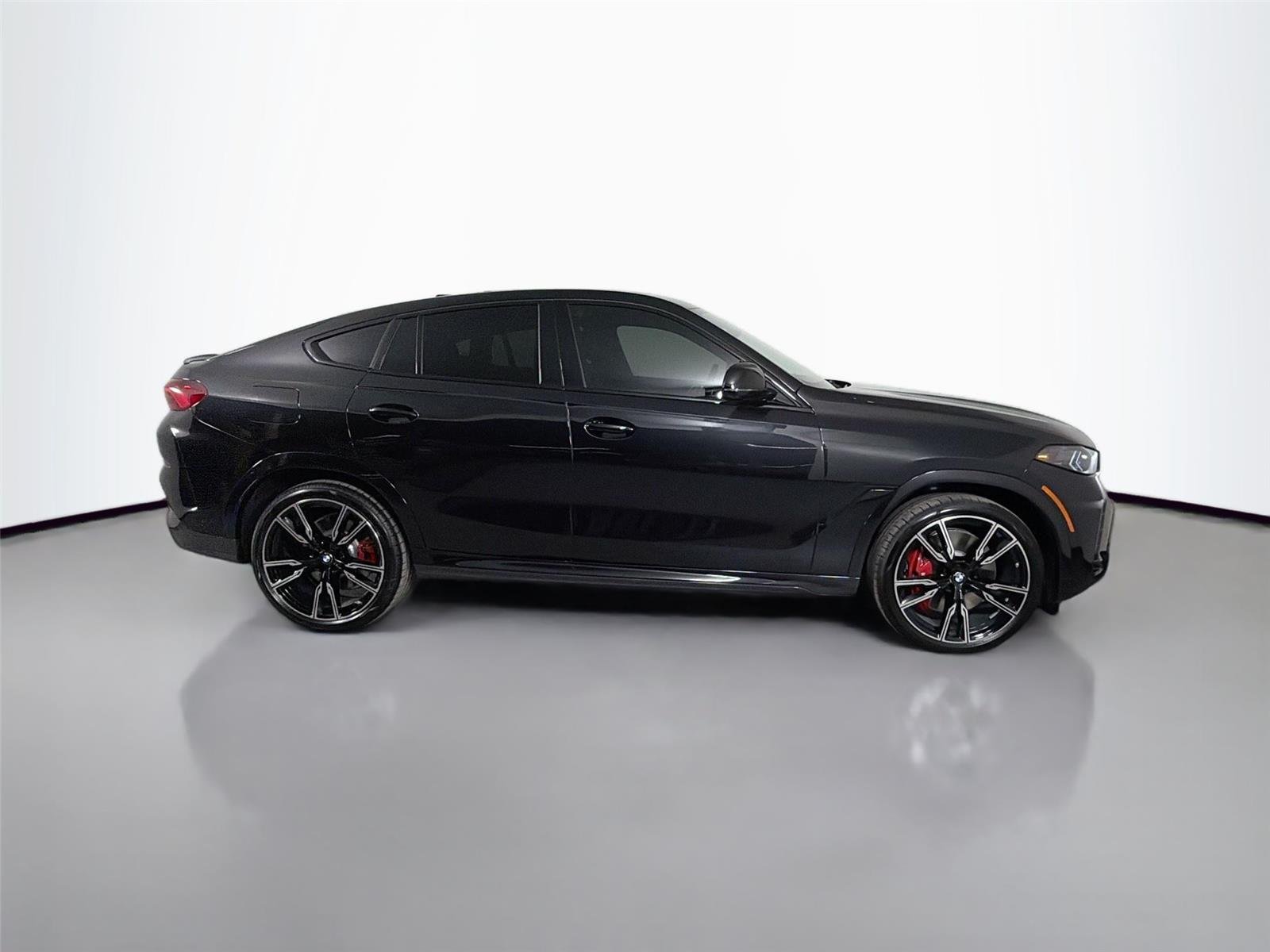 New 2027 Black Sapphire Metallic BMW M60i image 4