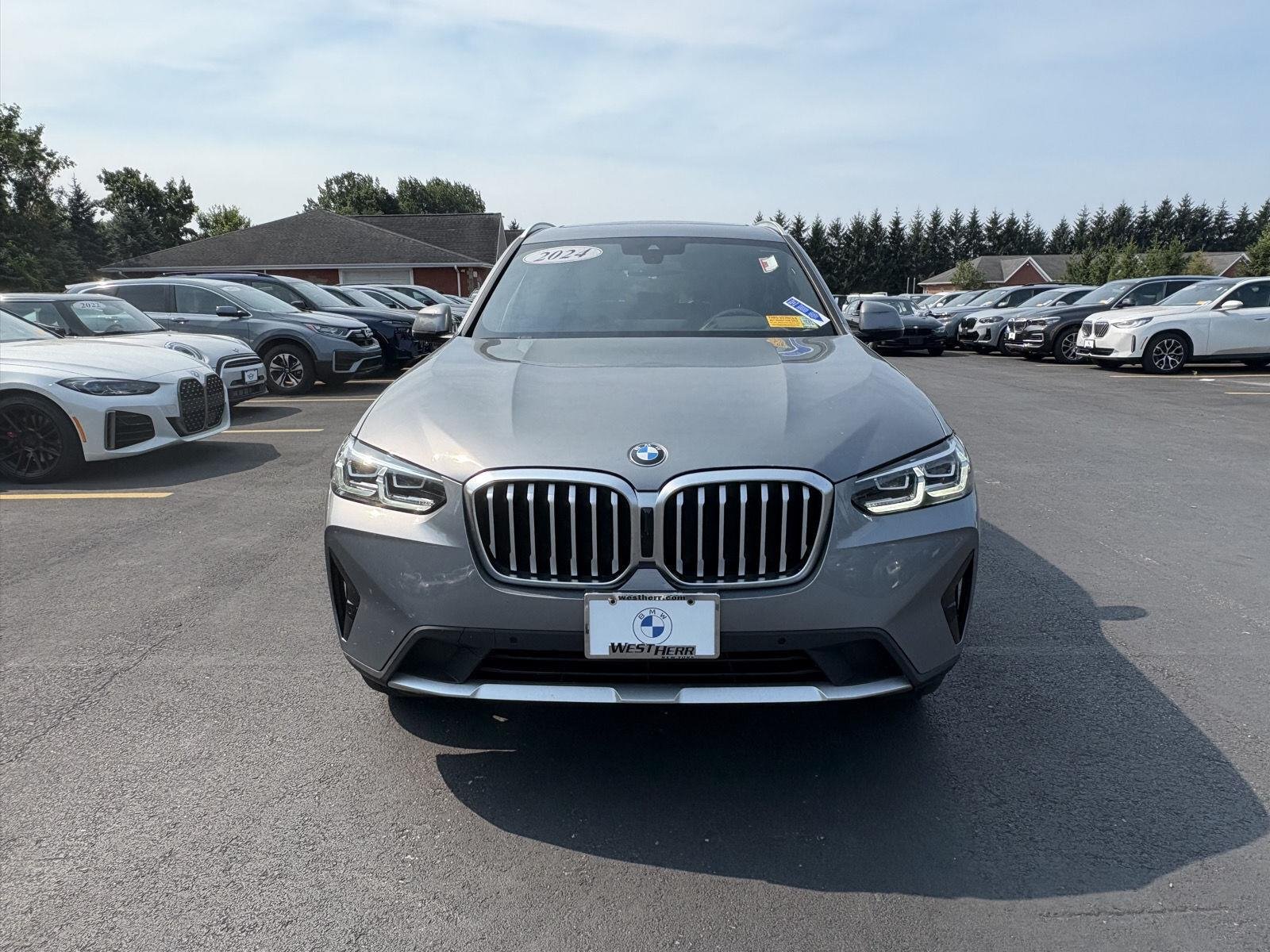 Used 2024 Skyscraper Grey Metallic BMW xDrive30i image 2