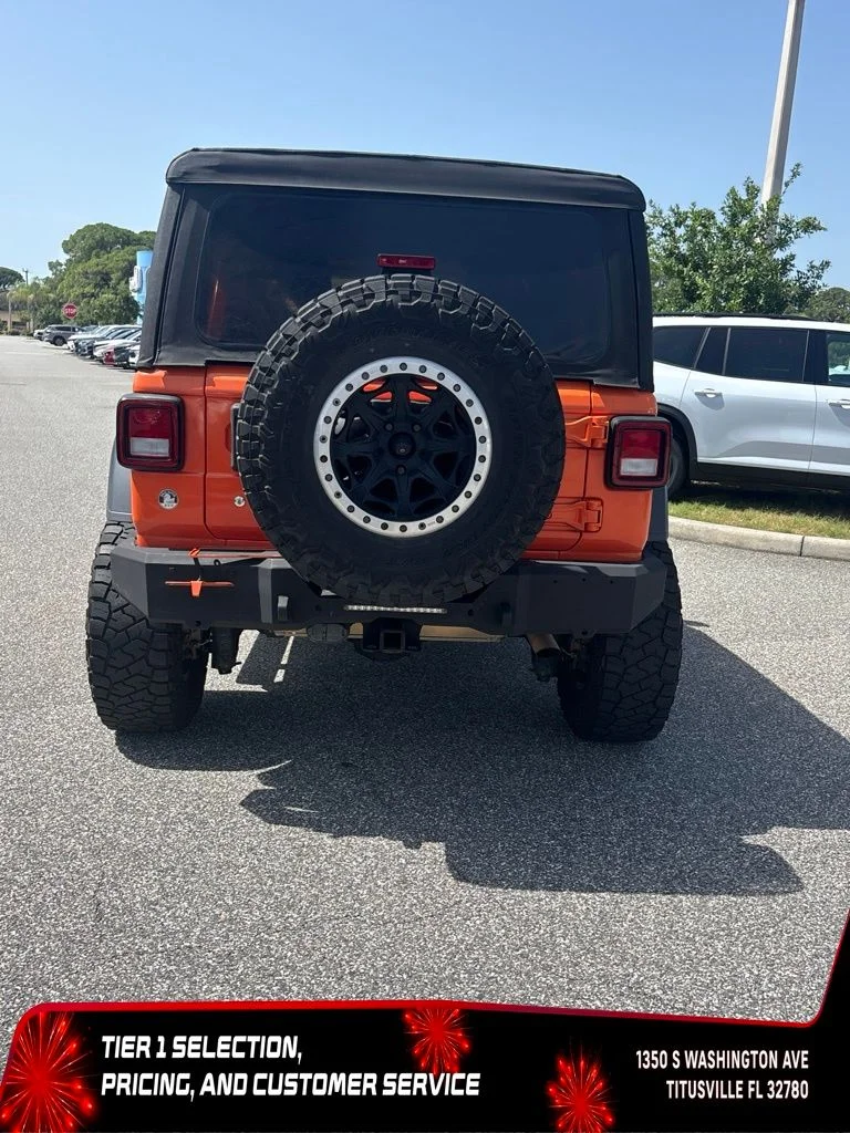 Used 2018 Orange Jeep Unlimited Sport image 4