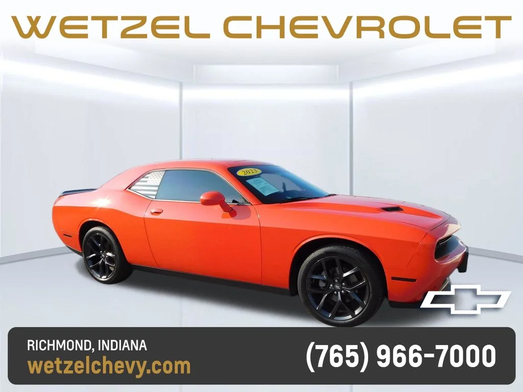 Used 2023 Orange Dodge SXT image 1