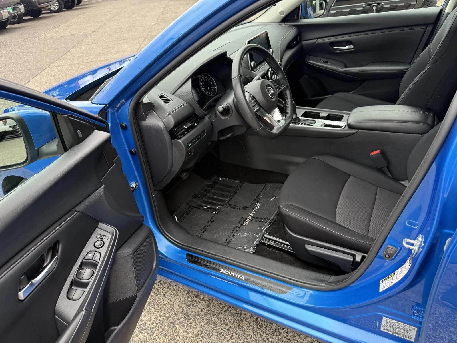 Used 2024 Electric Blue Metallic Nissan SV image 10