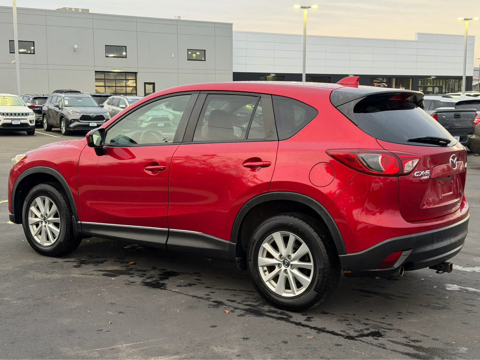 Used 2014 Mazda CX-5 Touring with VIN JM3KE4CYXE0302445 for sale in St. Cloud, Minnesota