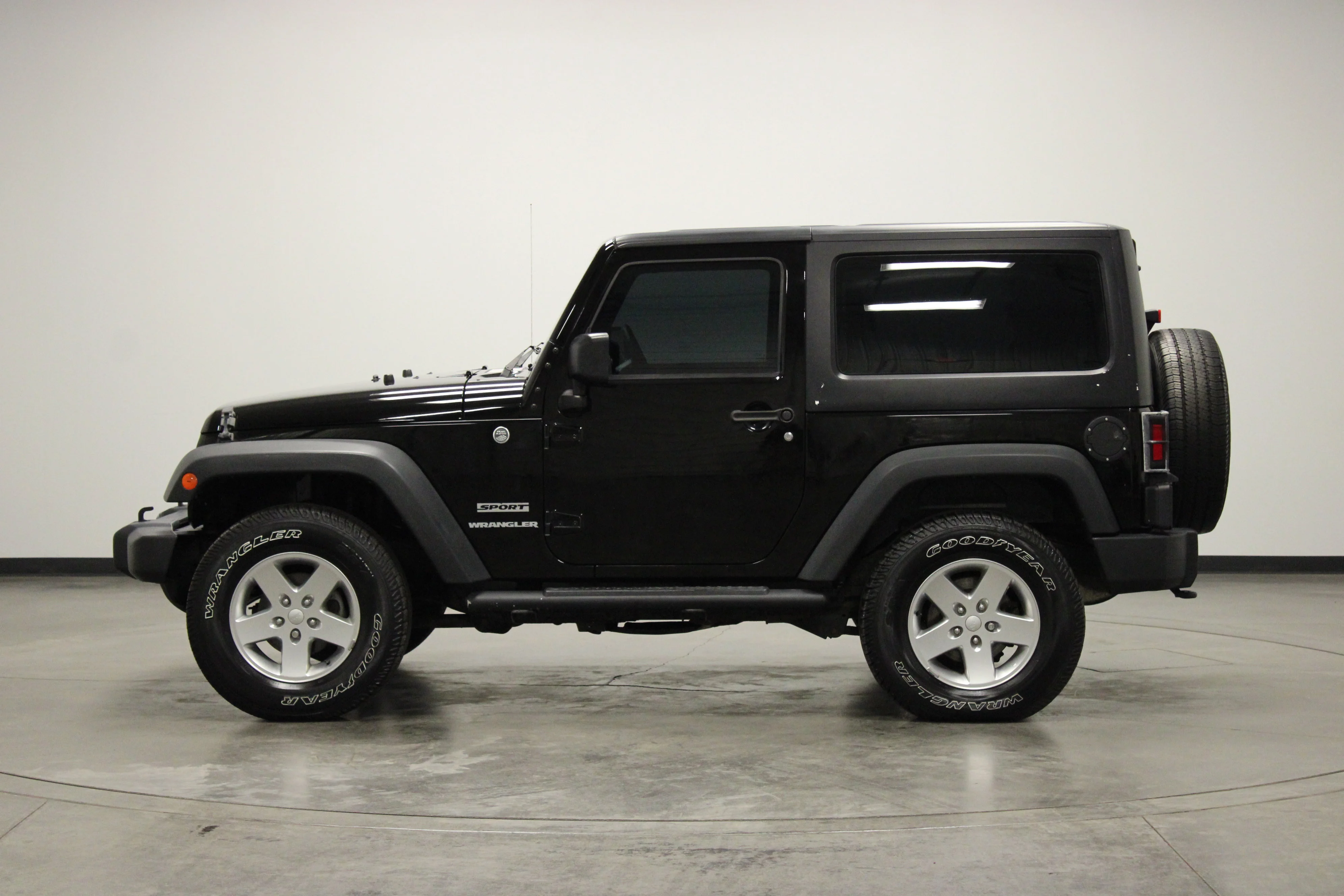 Used 2015 Black Clearcoat Jeep Sport image 5