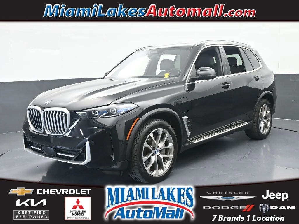 Used 2025 Black Sapphire Metallic BMW xDrive50e image 1