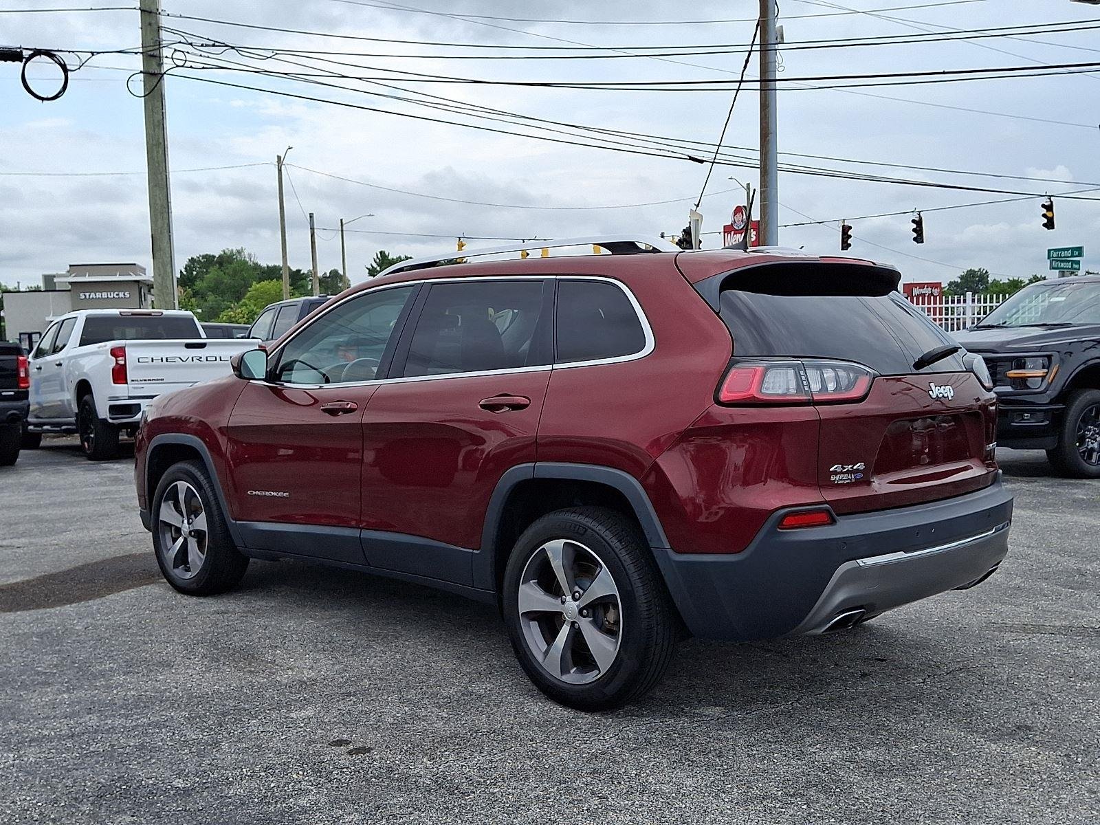 Used 2019 Velvet Red Pearlcoat Jeep Limited image 4