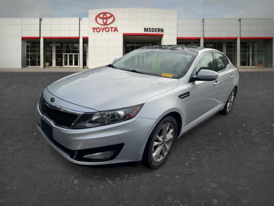 Used 2011 Bright Silver Kia EX image 1