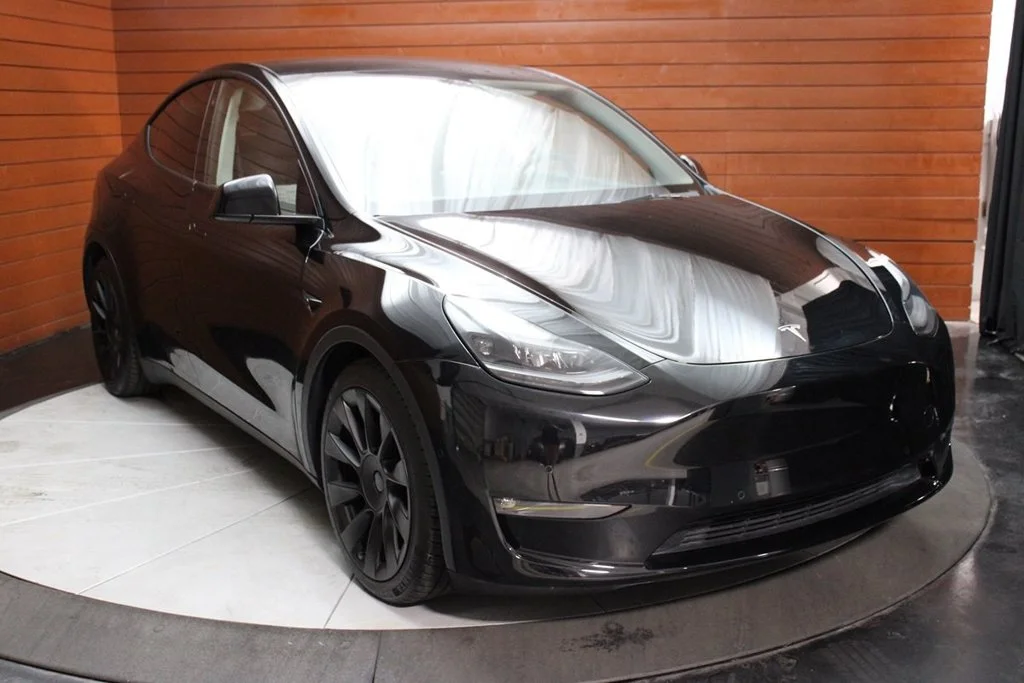 Used 2022 Solid Black Tesla Performance image 12