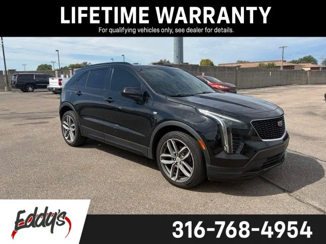 Used 2019 STELLAR BLACK METALLIC Cadillac AWD Sport image 1