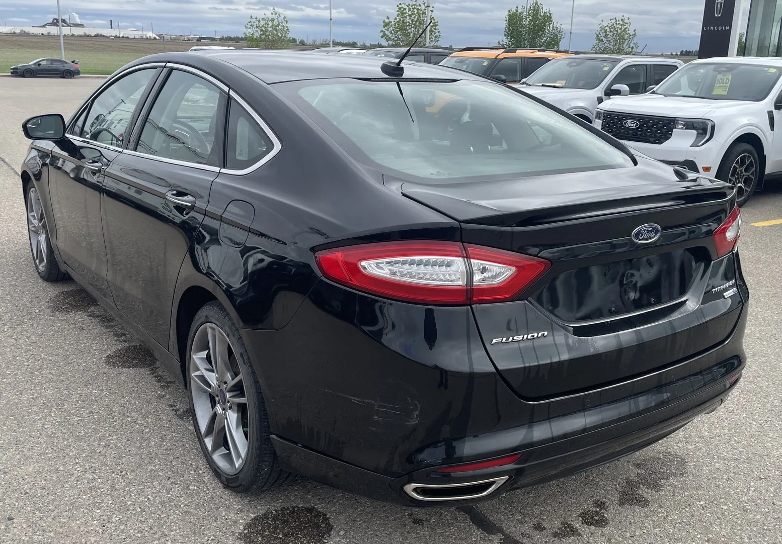 Used 2015 BLACK Ford TITANIUM AWD **New Arrival** image 3