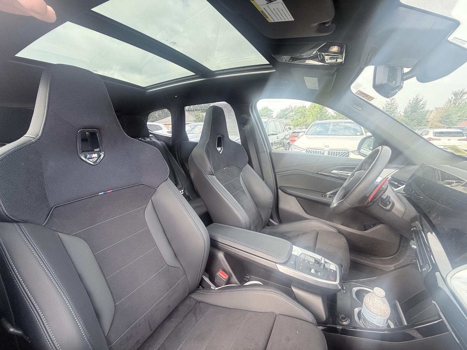 Used 2025 Black Sapphire Metallic BMW M35i image 9
