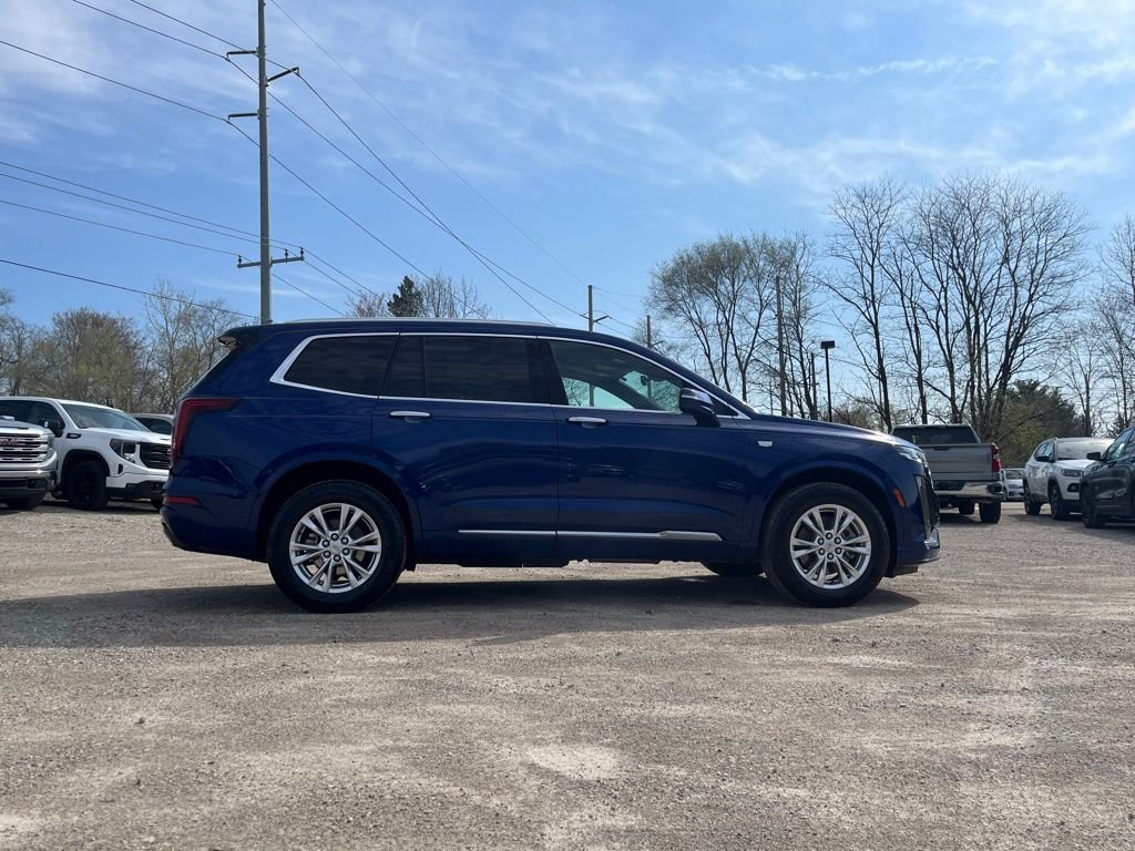 Used 2025 Blue Metallic Cadillac Luxury image 6