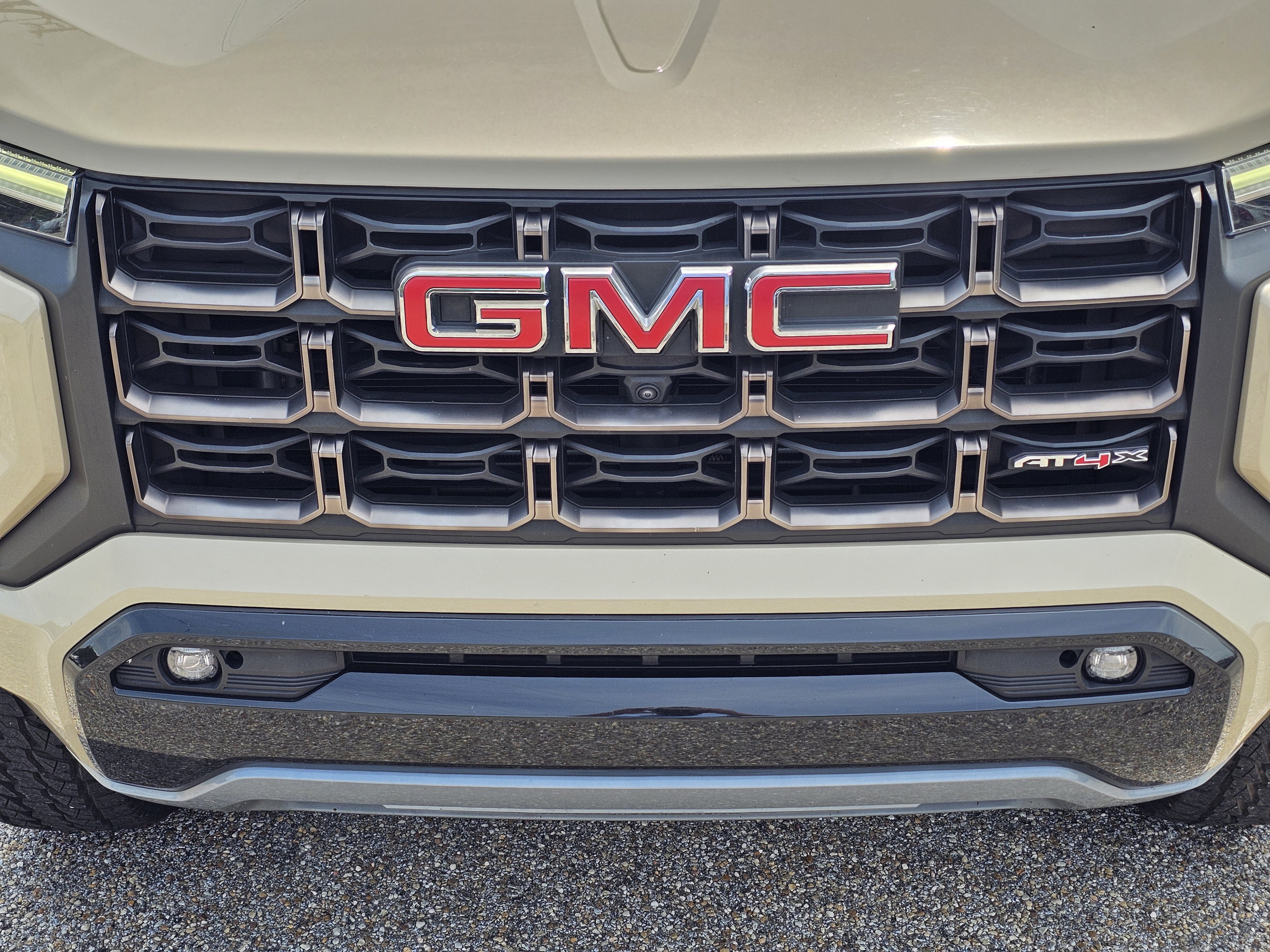 Used 2023 Desert Sand Metallic GMC 4WD AT4X image 3