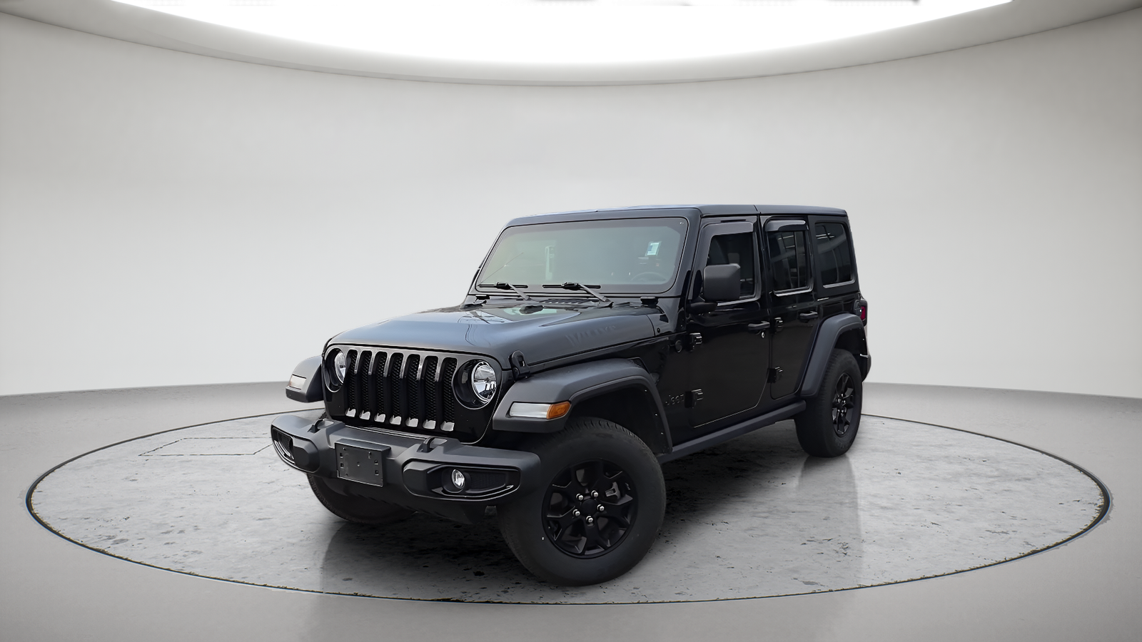 Used 2021 Black Clearcoat Jeep Unlimited Willys image 1