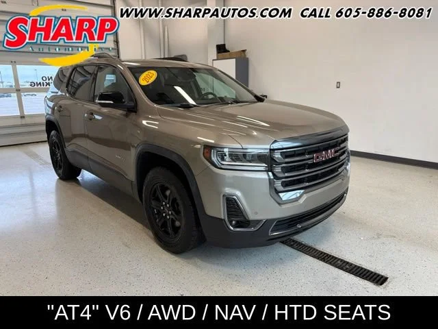 Used 2023 Light Stone Metallic GMC AT4 image 1
