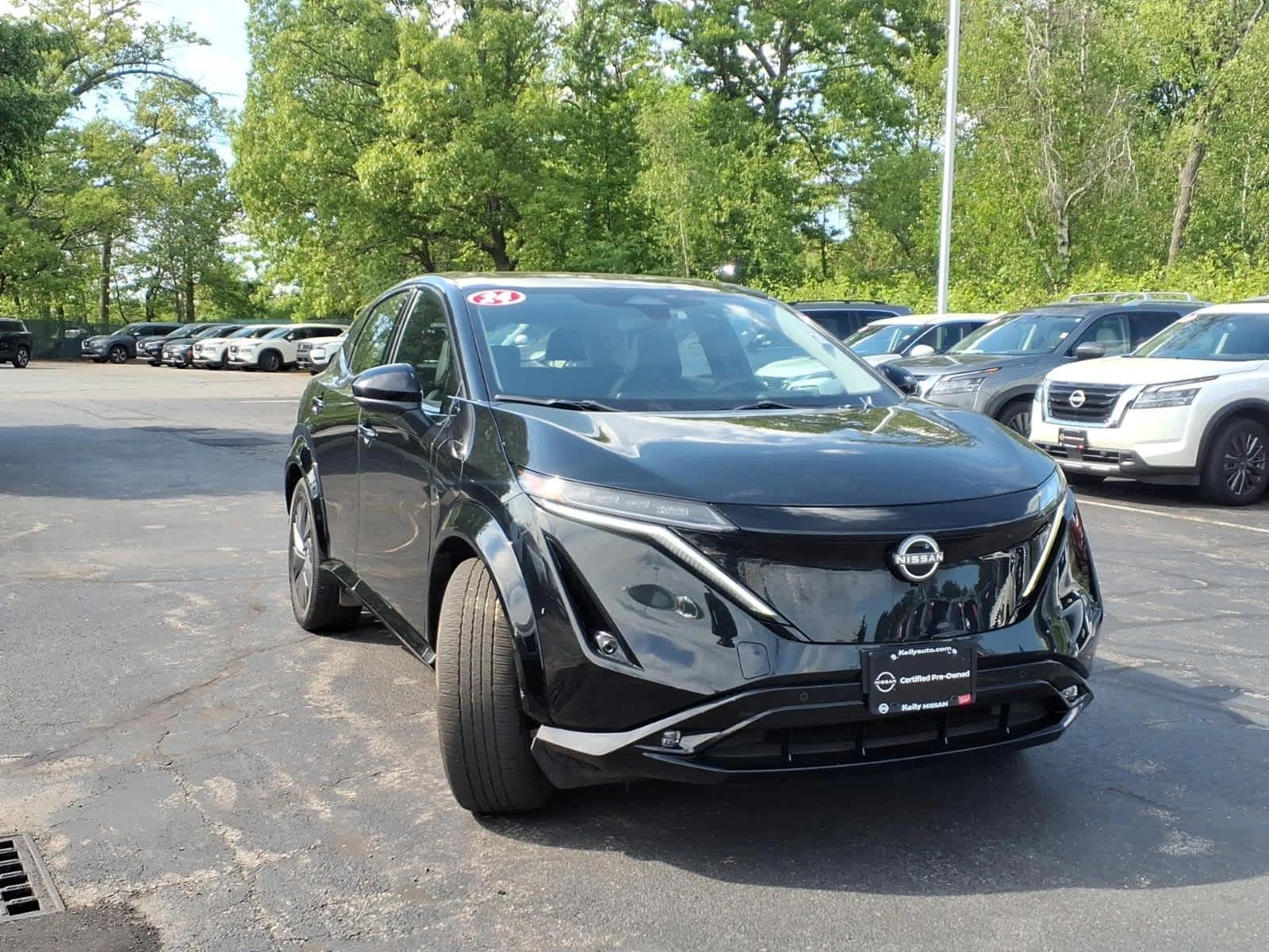 Certified Used 2024 Black Diamond Pearl Nissan EVOLVE+ image 3