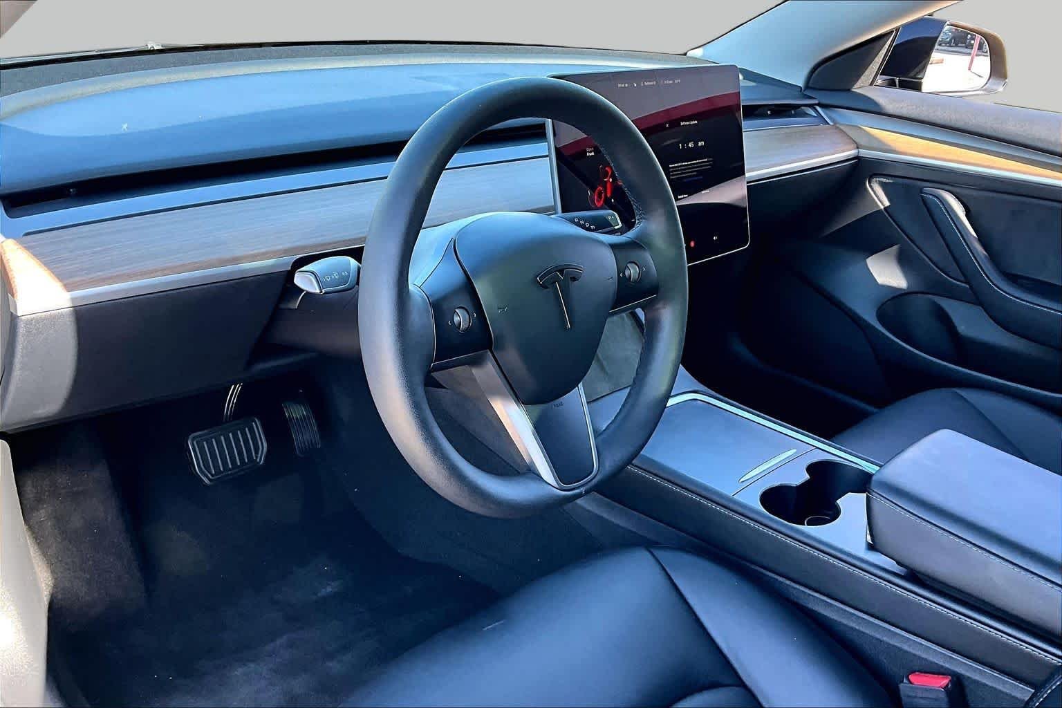 Used 2023 Solid Black Tesla  image 16