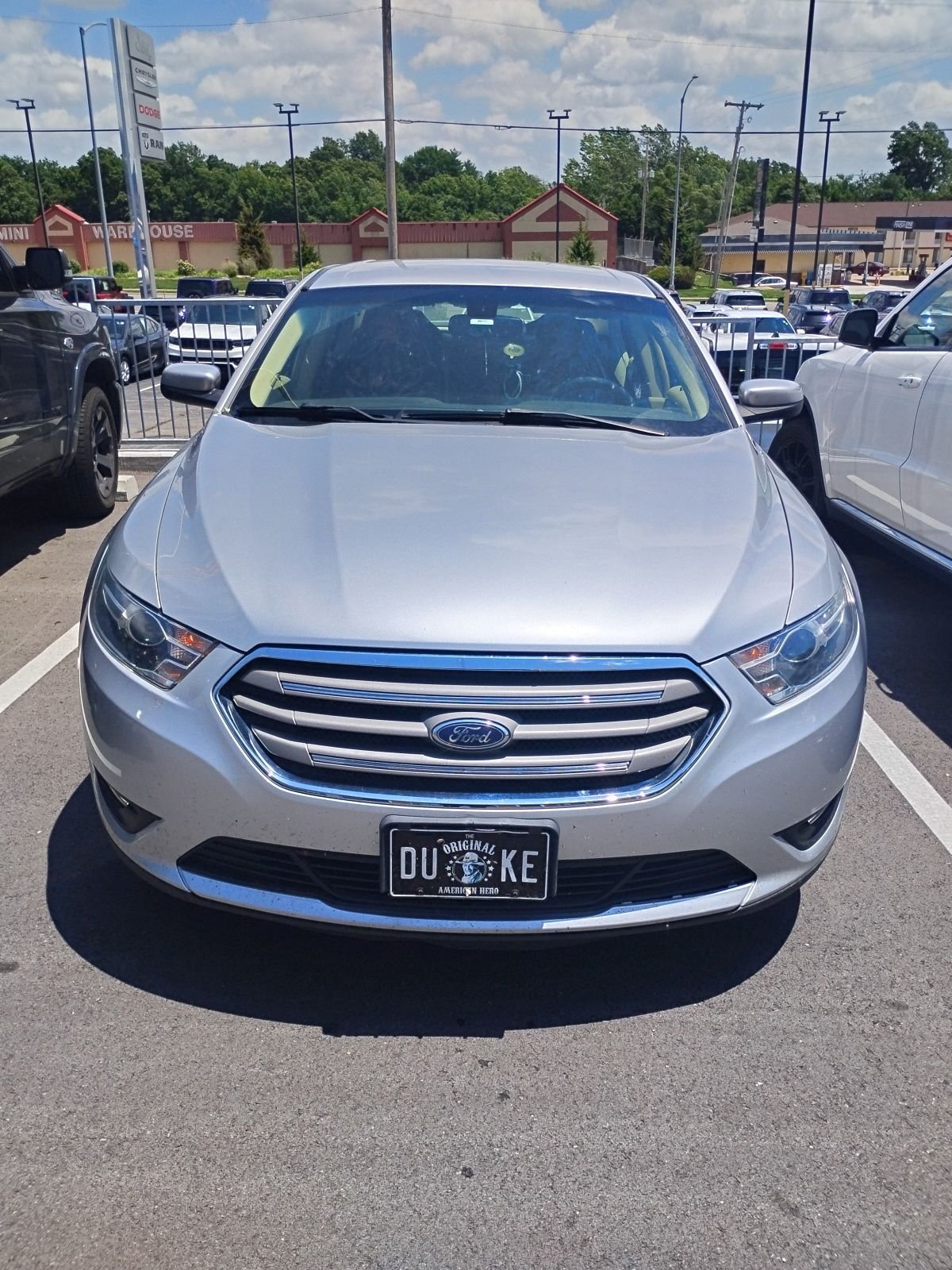 Used 2016 Ford Taurus SEL with VIN 1FAHP2E86GG142935 for sale in Lansing, KS