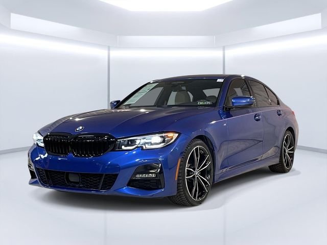 Used 2019 Blue BMW 330i xDrive image 1
