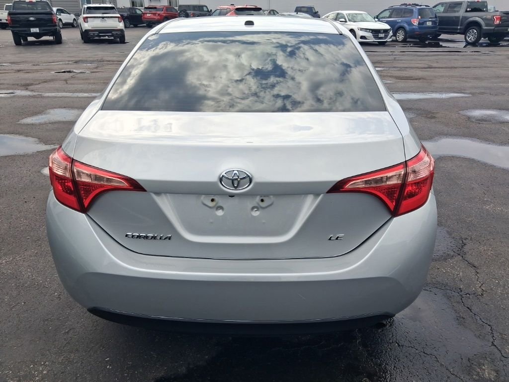 Used 2019 Classic Silver Metallic Toyota LE image 3