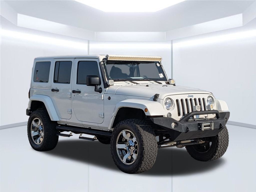 Used 2014 White Jeep Unlimited Sahara image 8