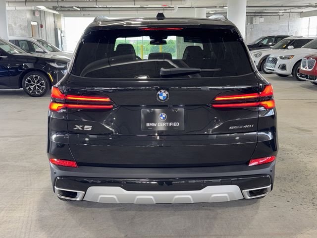 Certified Used 2026 Black Sapphire Metallic BMW sDrive40i image 7