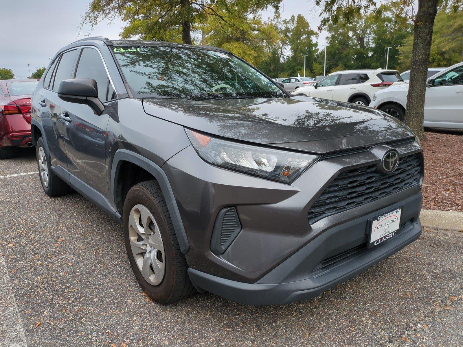 Used 2021 Magnetic Gray Metallic Toyota LE image 1