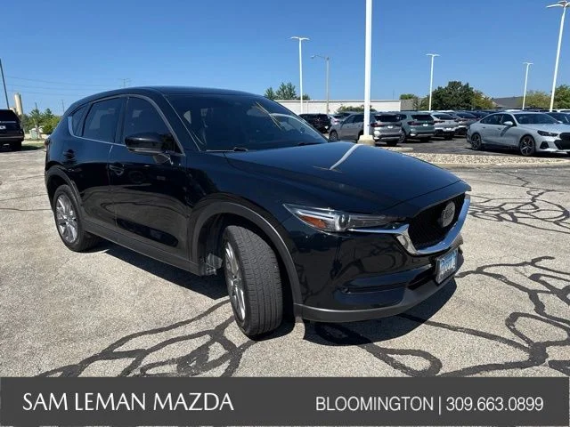 Used 2021 Black Mazda Grand Touring image 1