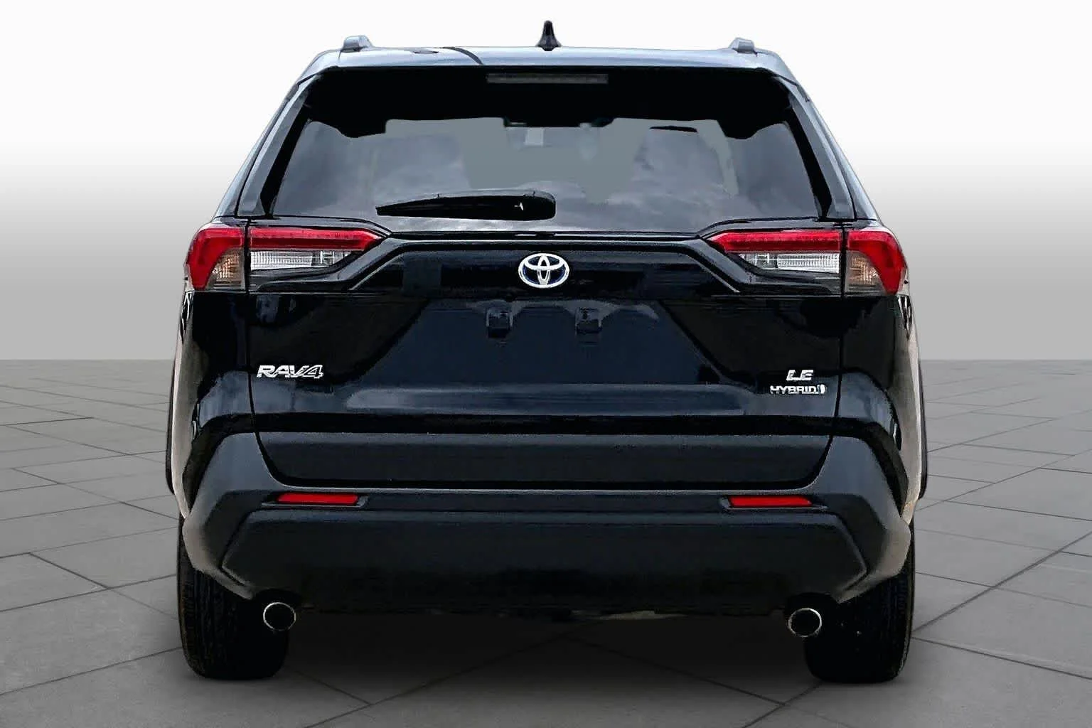 Used 2024 Midnight Black Metallic Toyota Hybrid LE image 5