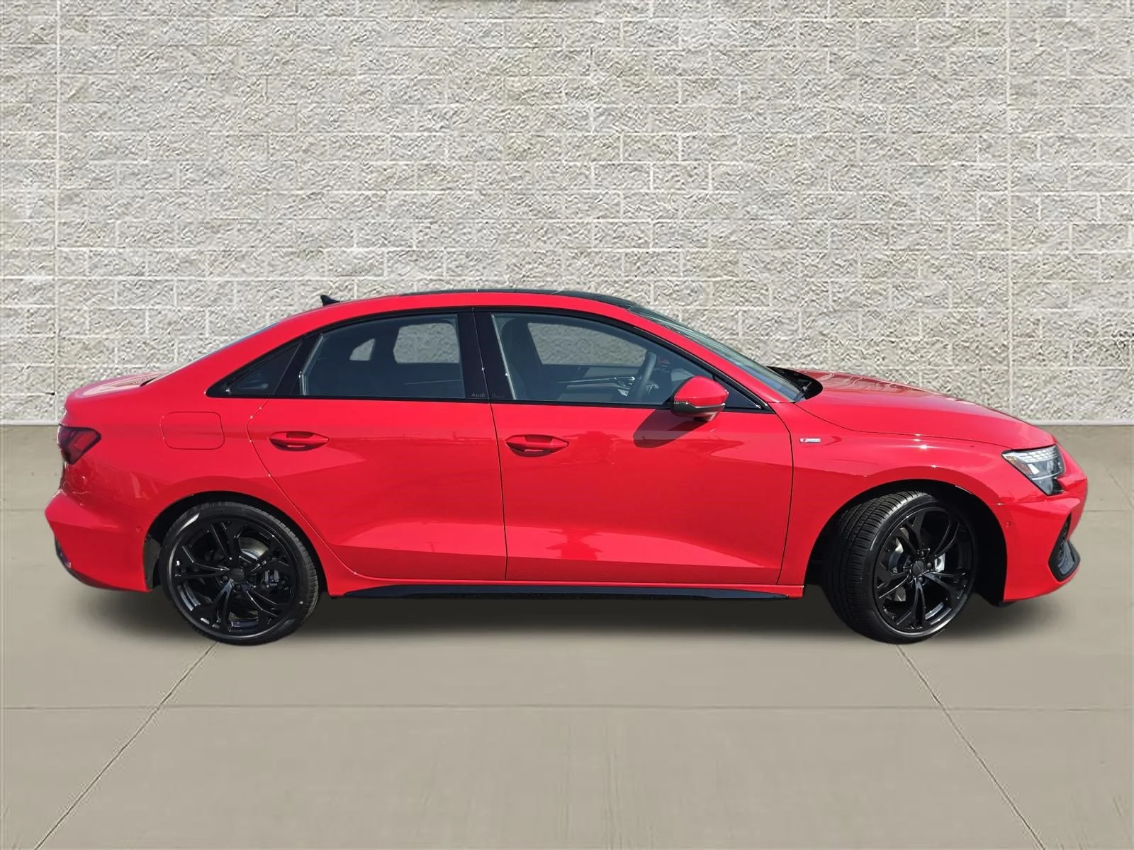 New 2026 Progressive Red Metallic Audi Premium Plus image 8