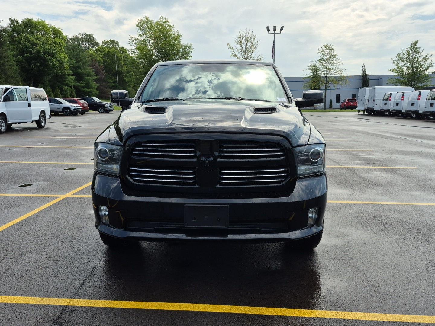 Used 2016 Brilliant Black Crystal Pearlcoat Ram Sport image 2